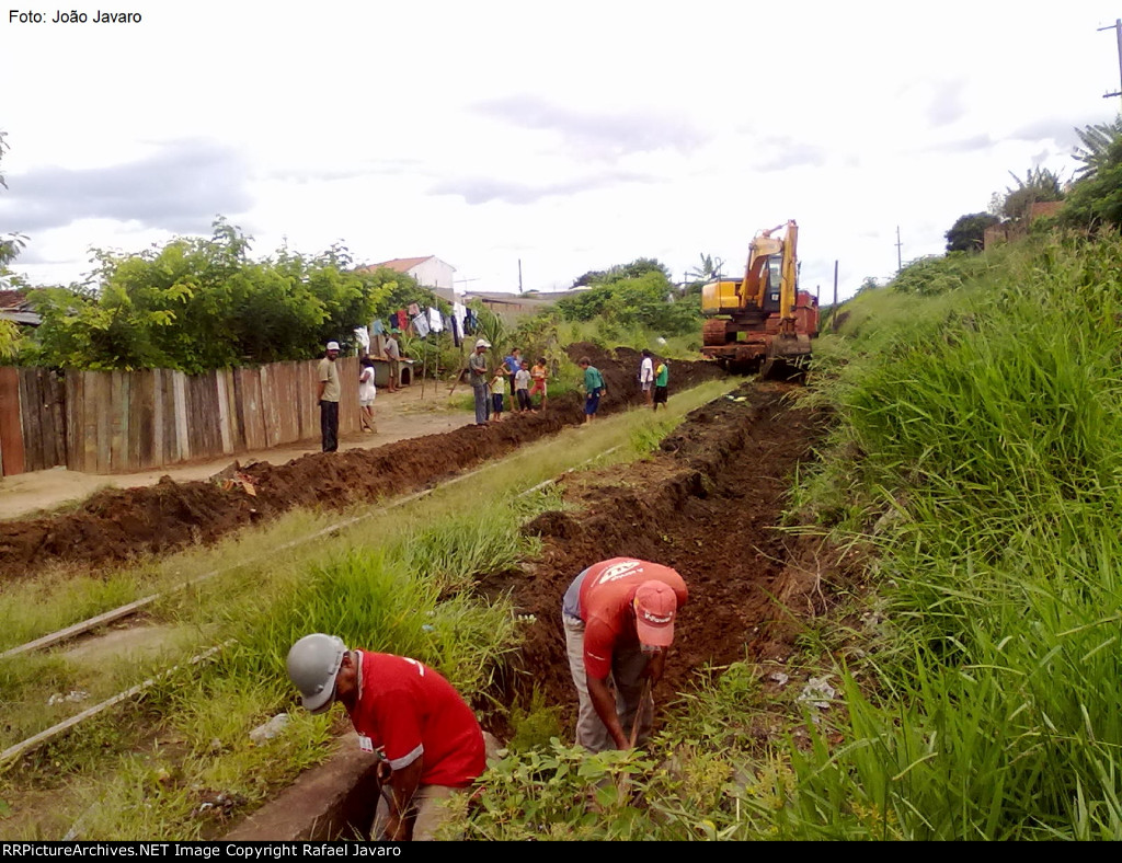 Maintenance team reopening drainage channels